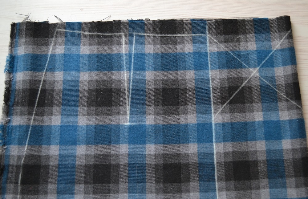 Place front part a skirt pattern on the fabric