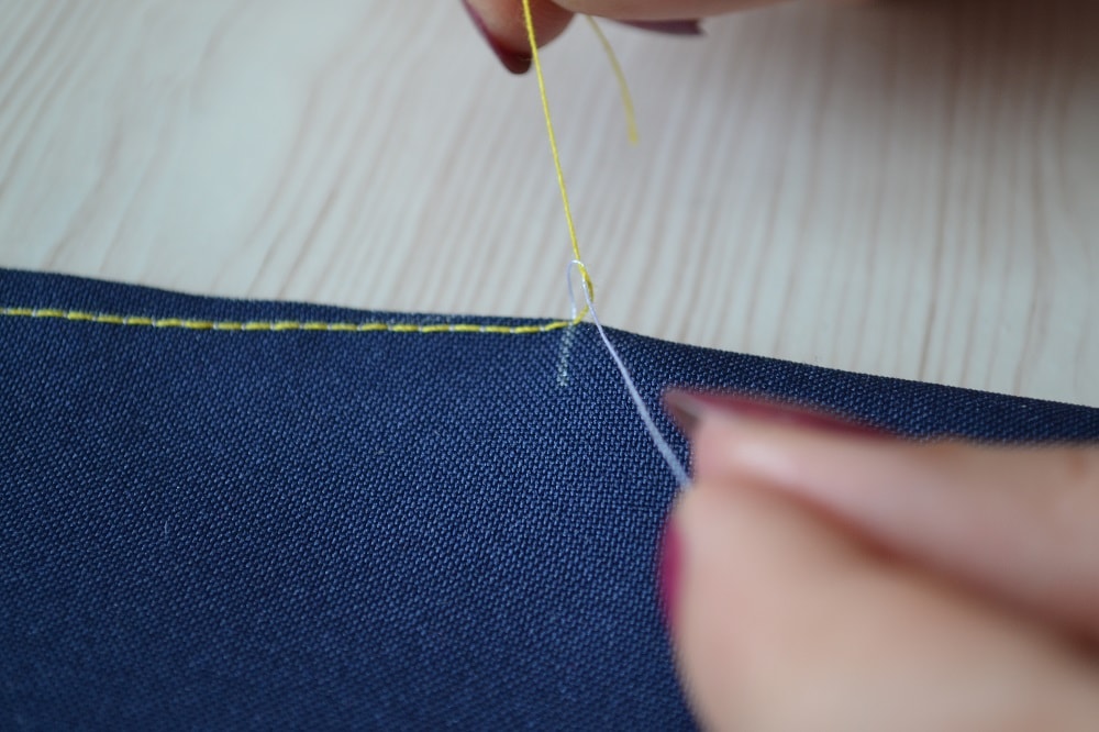 Tie both ends of the threads