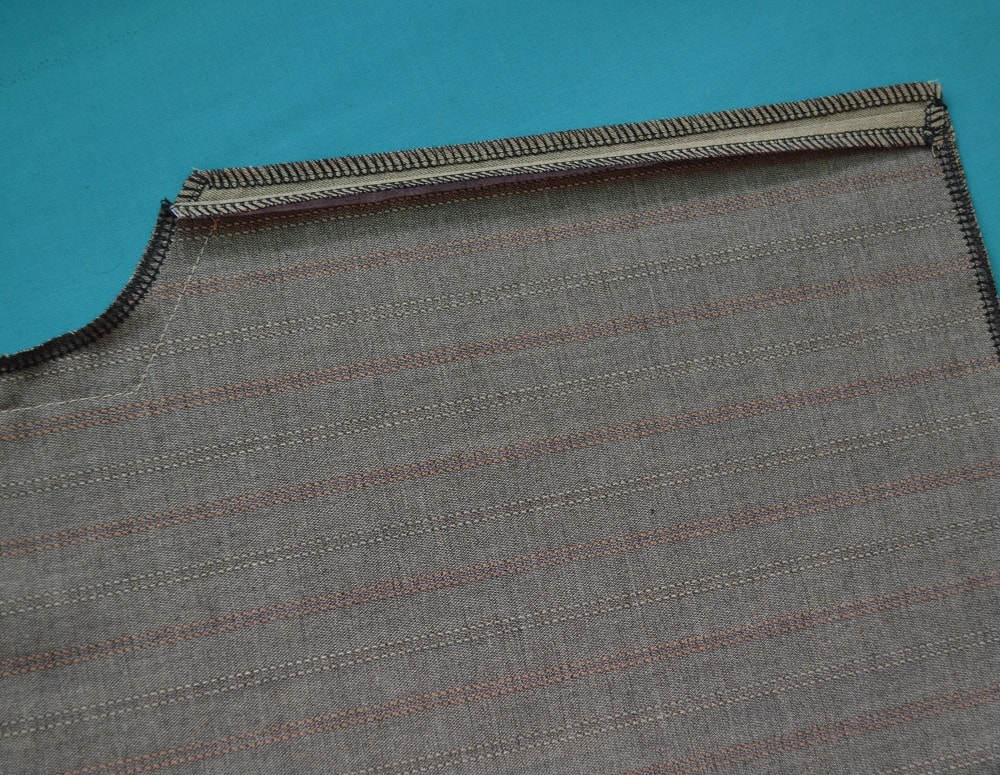 Now fold the edge of vent