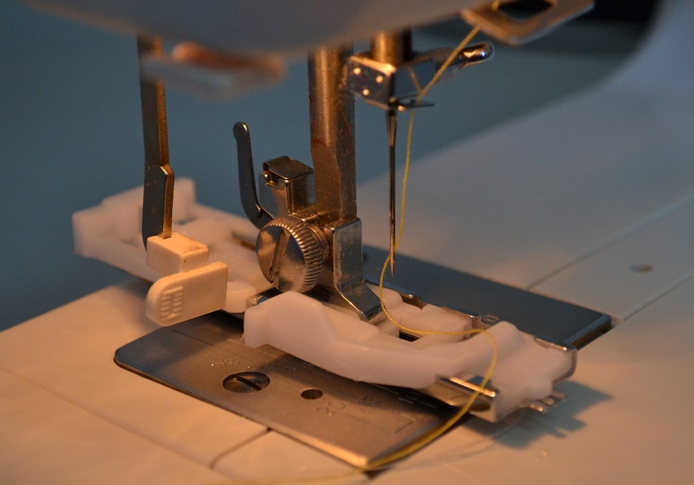 Sewing machines with automatic buttonhole