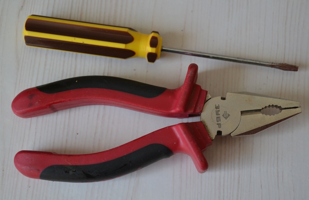 Screwdriver and pliers