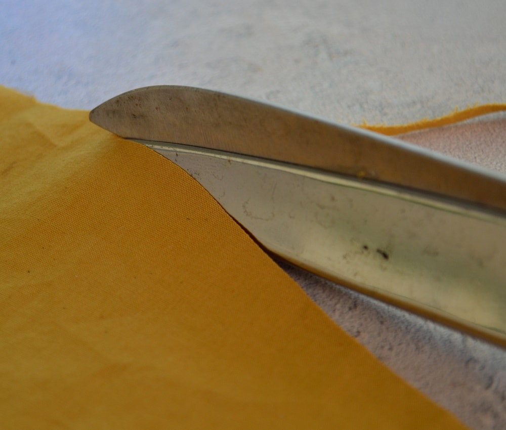 How to check correctness of scissors sharpening