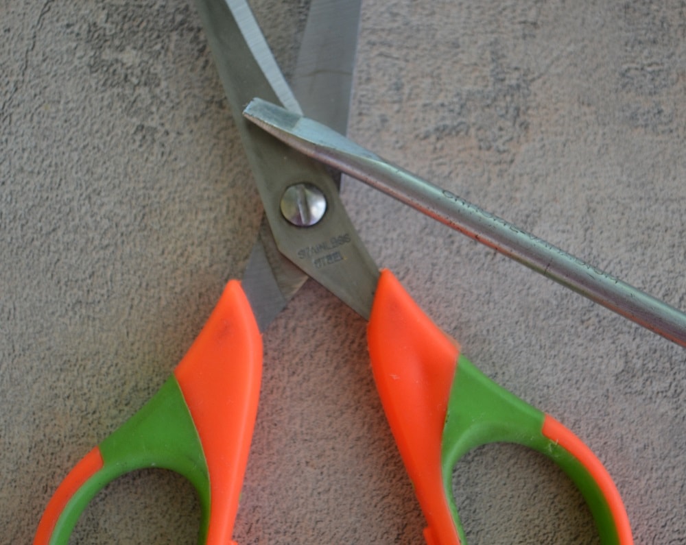 Some scissors can be untwisted with a screwdriver