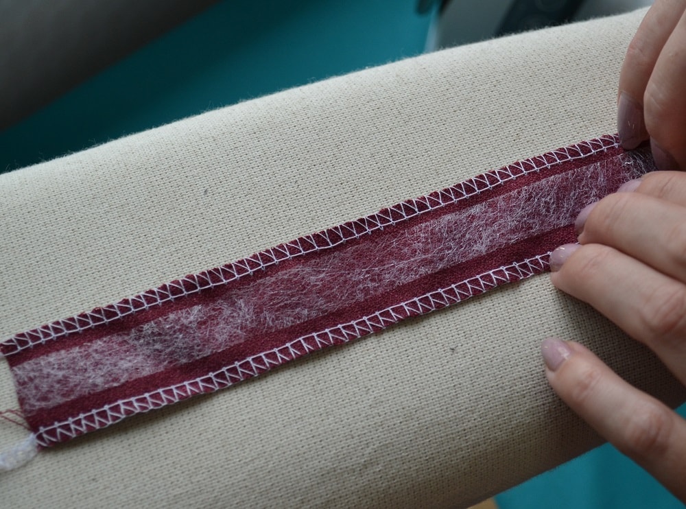 Fusible strip has the same length as belt loop