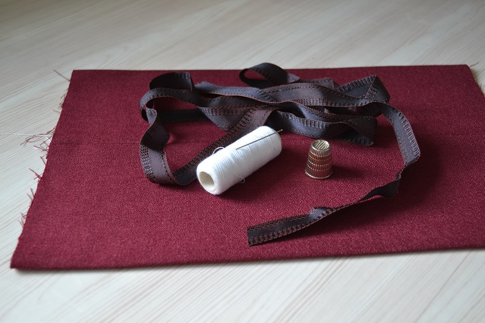Sewing thread, fabric and kick tape