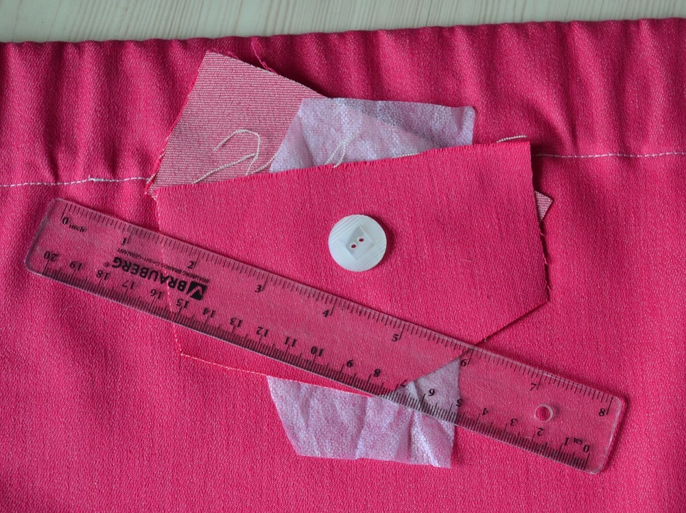 This pocket flap consists of two pieces a fabric