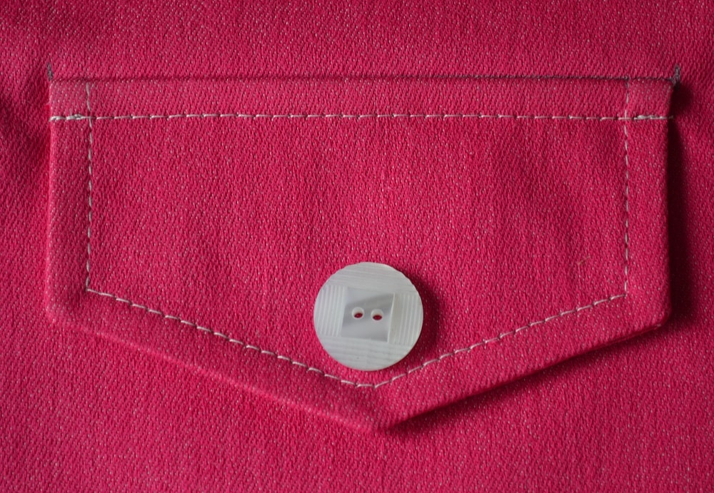 Attach a button to pockets flap