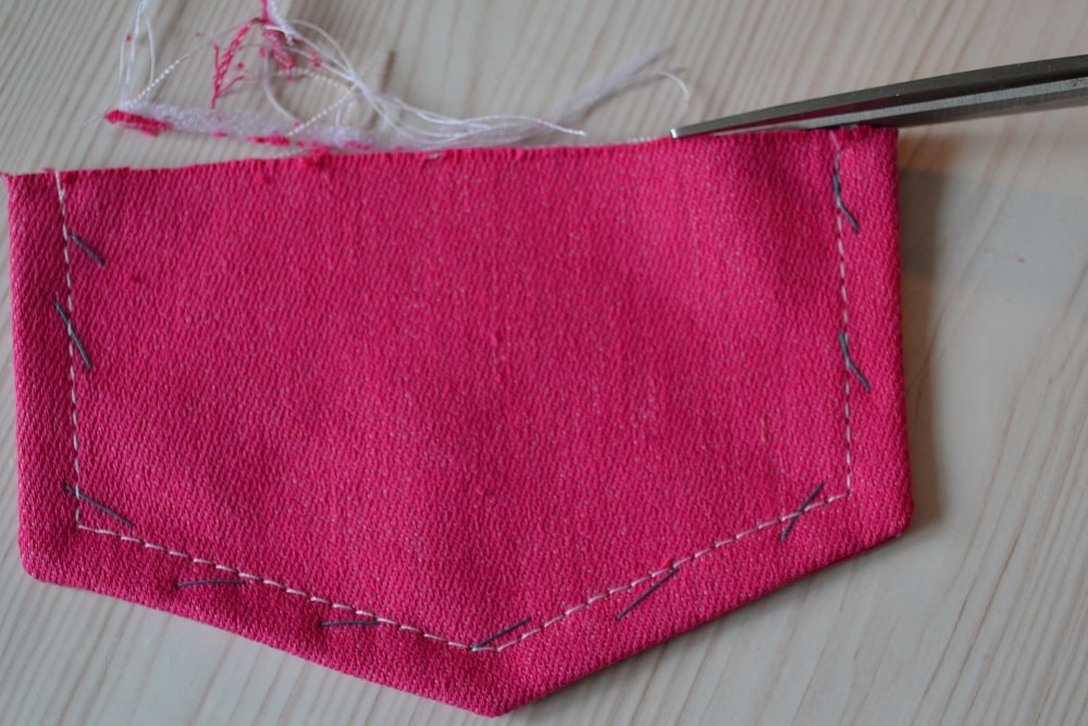 Make finishing stitch near rib
