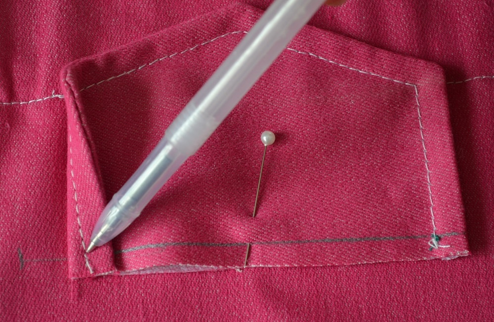 Mark a line where will be sewn pocket flap