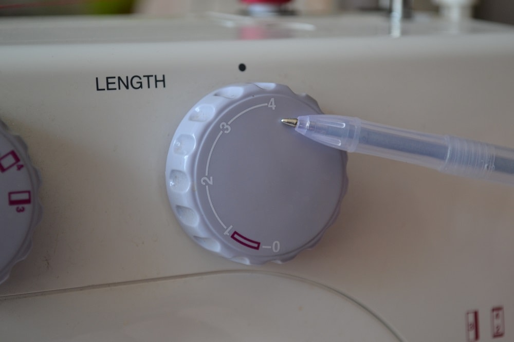 Stitch length regulator