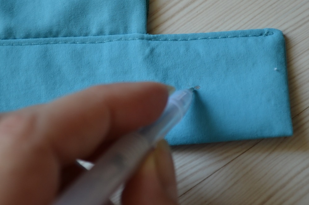 How to attach the button to waistband