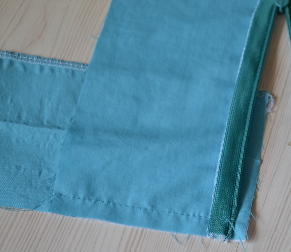 How to stitch edge of waistband to skirt