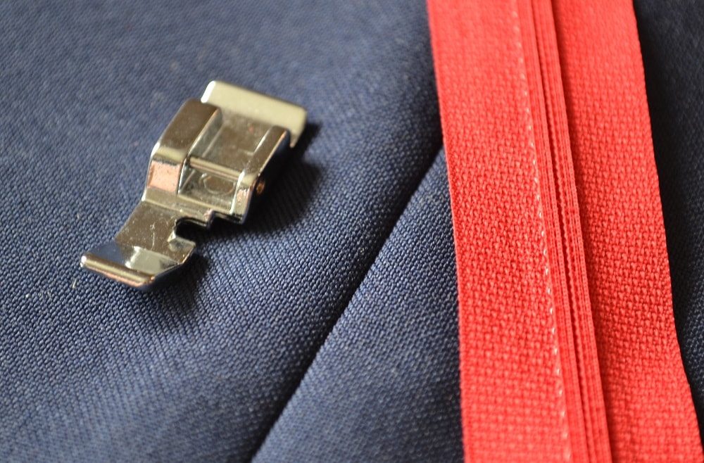 Presser foot for centered zipper